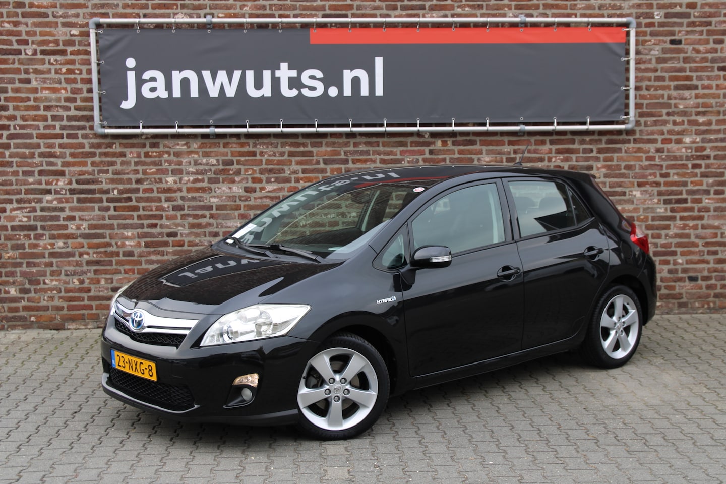 Toyota Auris - 1.8 Hybrid Executive + trekhaak - AutoWereld.nl