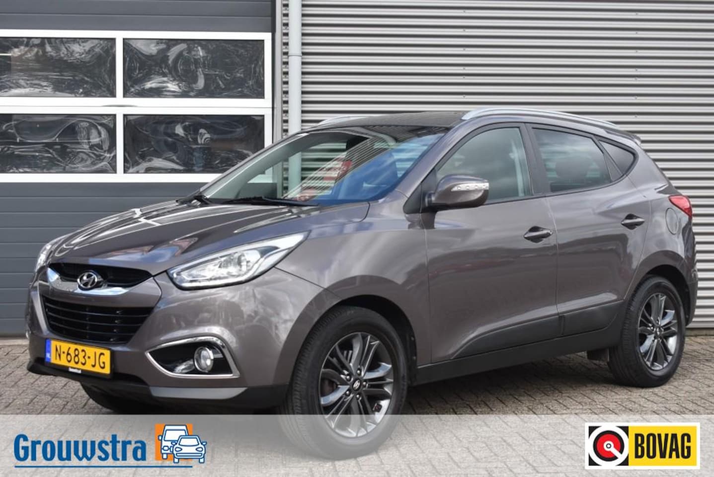Hyundai Tucson - 2.0I I-VISION / STUURWIEL / STOELEN VERWARMD / TREKHAAK - AutoWereld.nl