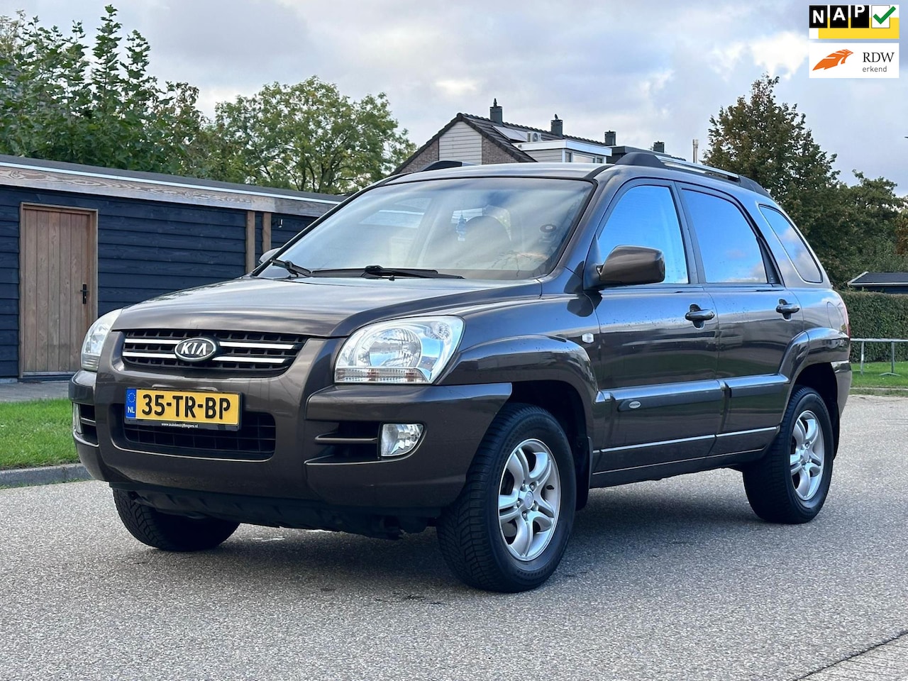 Kia Sportage - 2.0 CVVT M-bition Cruise*Half leder*Trekhaak*Stoelverwarming*LM velgen*Airco*NAP*2e eigena - AutoWereld.nl