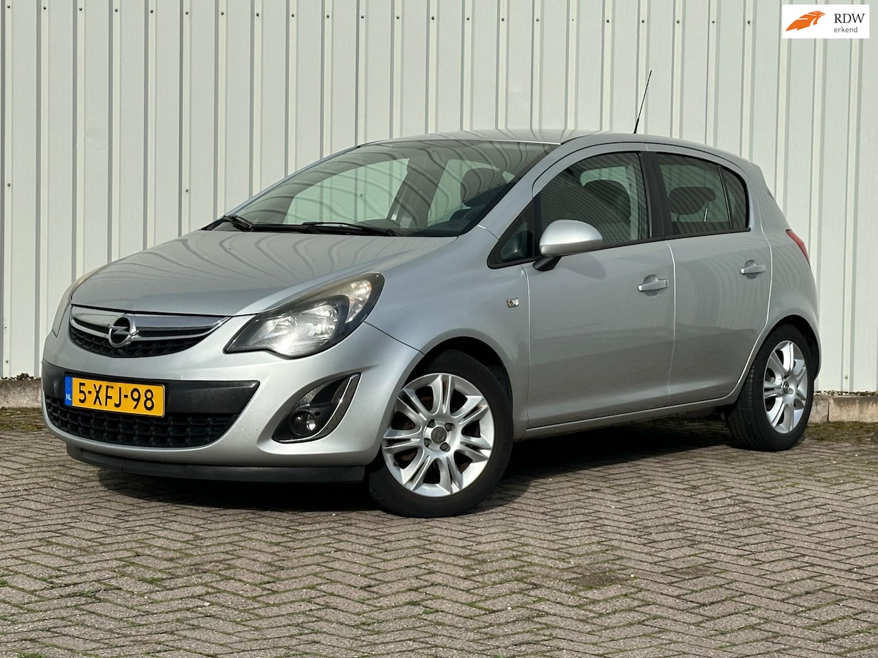 Opel Corsa - 1.2-16V BlitZ|Navi|PDC|Cruise|Airco|NAP - AutoWereld.nl