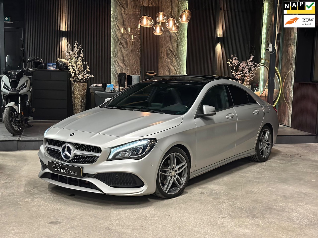 Mercedes-Benz CLA-Klasse - 180 AMG|PANO|MEMORY|H&K|BOMVOL - AutoWereld.nl