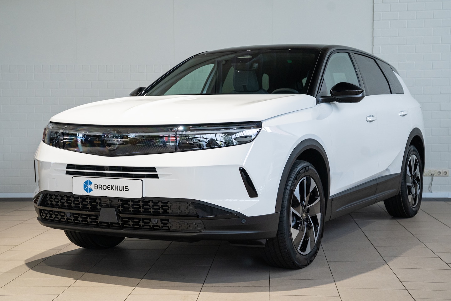 Opel Grandland - 1.2 145PK Hybride GS | Panoramadak | Two-Tone | Head-up Display | Navigatie | Adaptive Cru - AutoWereld.nl