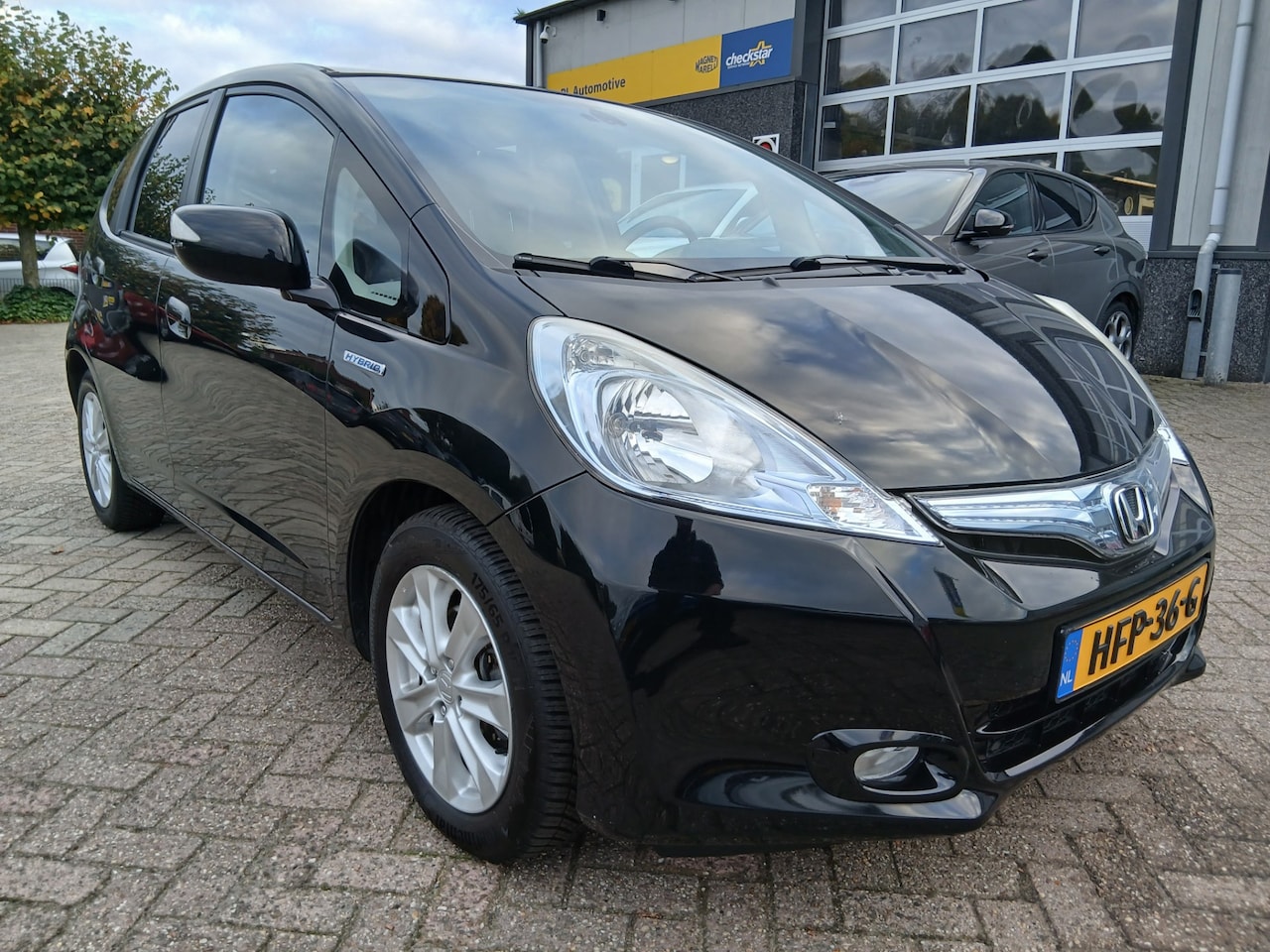 Honda Jazz - 1.4 Hybrid Elegance - Airco - Cruise Control - AutoWereld.nl