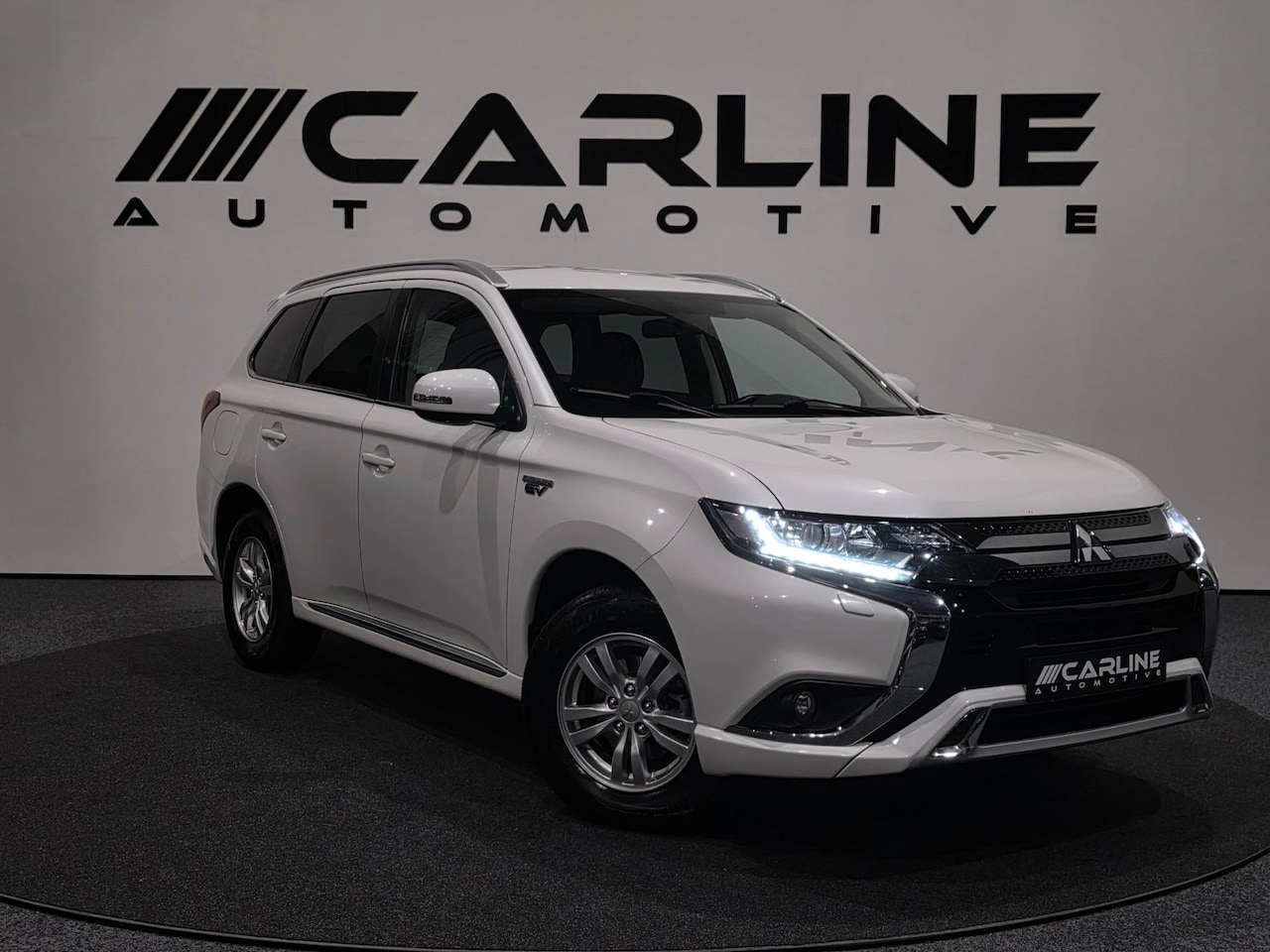 Mitsubishi Outlander - 2.4 PHEV Pure AUT. PLUG-IN HYBRIDE ASSIST CAMERA PDC TREKHAAK KEYLESS GARANTIE NAP APK - AutoWereld.nl