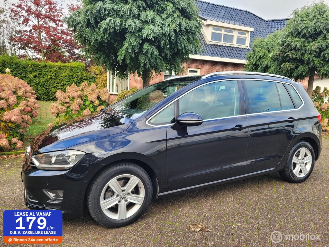 Volkswagen Golf Sportsvan - 1.2 TSI Highline 1.2 TSI Highline ,trekhaak,navi,lm - AutoWereld.nl