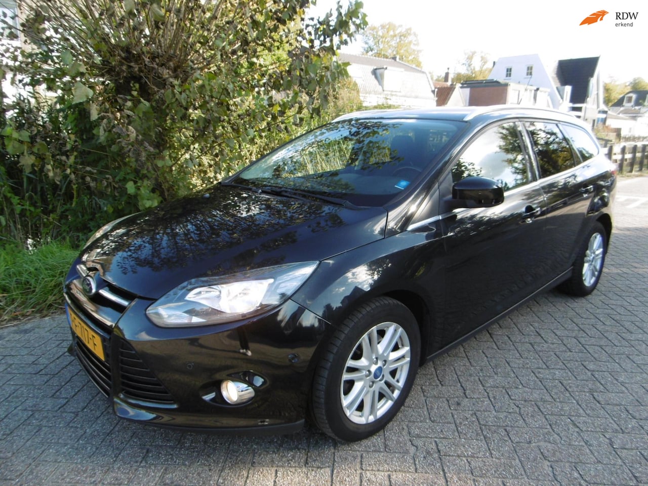 Ford Focus Wagon - 1.6 EcoBoost Titanium 182pk Clima Navi Trekhaak 1500kg - AutoWereld.nl