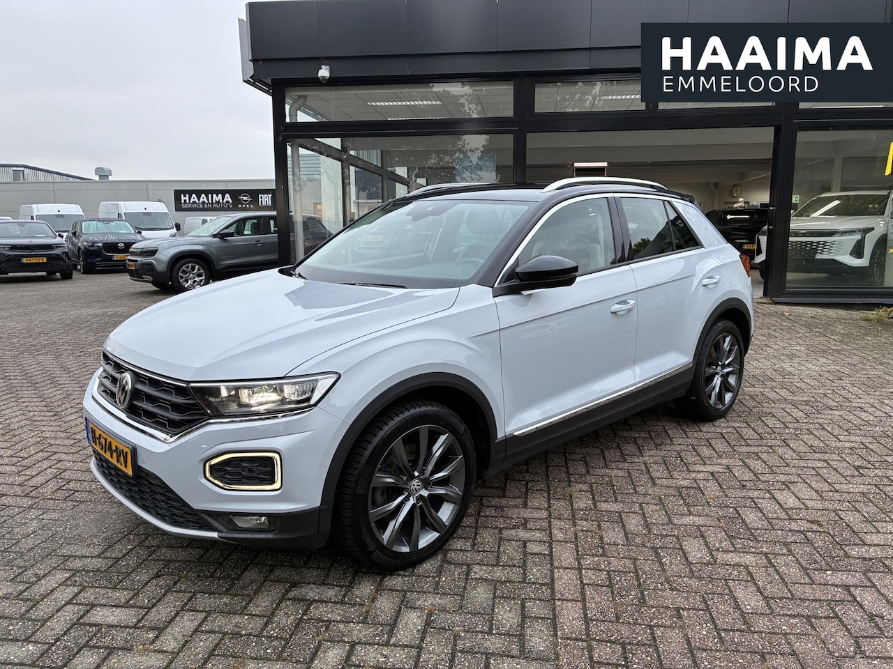 Volkswagen T-Roc - 1.5 TSI Sport | Climate control | Navigatie | Parkpilot | Afneembare Trekhaak | Elektrisch - AutoWereld.nl