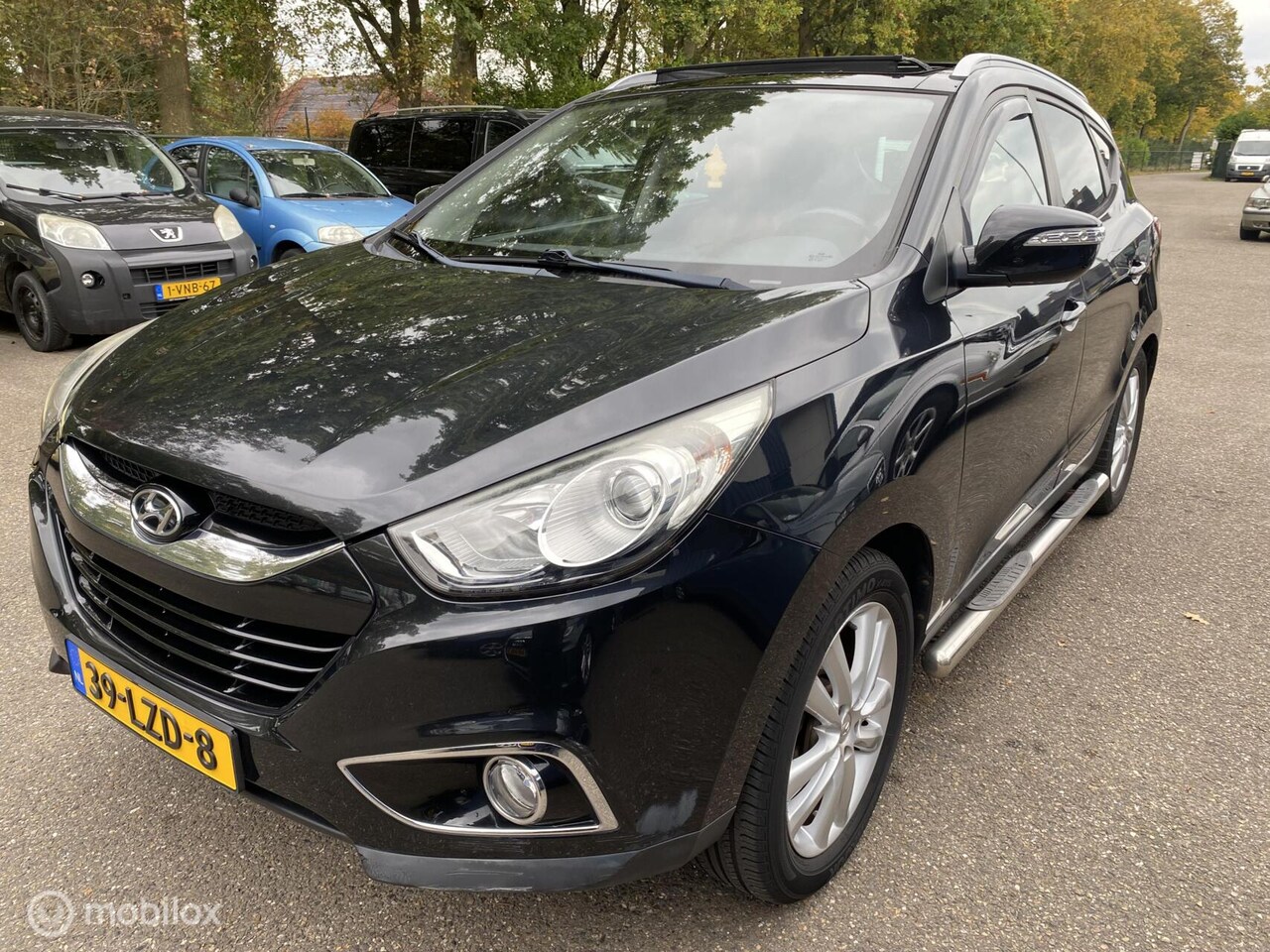 Hyundai ix35 - 2.0i i-Catcher 154.DKM AUTOMAAT ECC PANO CRUISE NAVI CAM TREKHAAK - AutoWereld.nl
