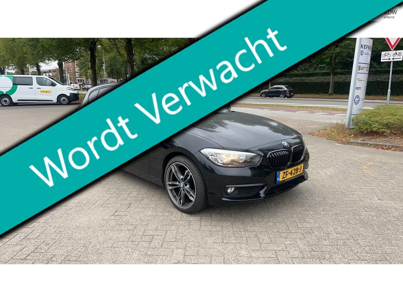 BMW 1-serie - 116i Sport 5-deurs 109pk Clima Cruise Navi PDC Historie - AutoWereld.nl