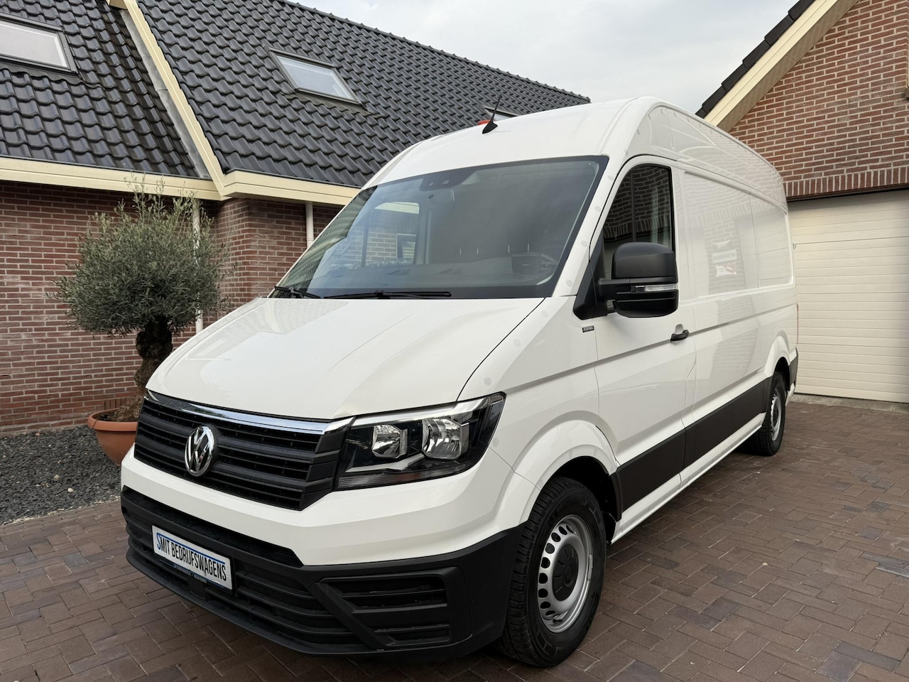 Volkswagen Crafter - 35 2.0 TDI L3H3 Highline service bus Sortimo - AutoWereld.nl
