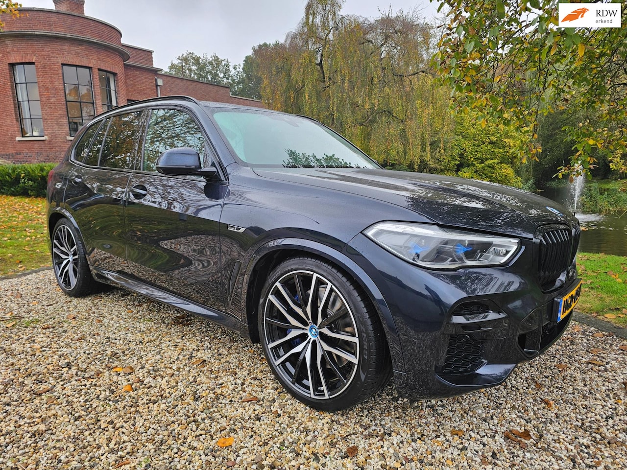 BMW X5 - XDrive45e High Executive 22"/panorama/TREKHAAK - AutoWereld.nl