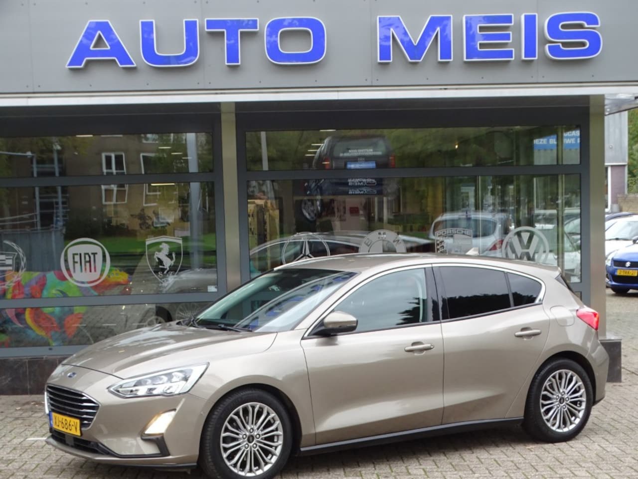 Ford Focus - 1.0 ECOB. TIT. BNS Navi Camera - AutoWereld.nl