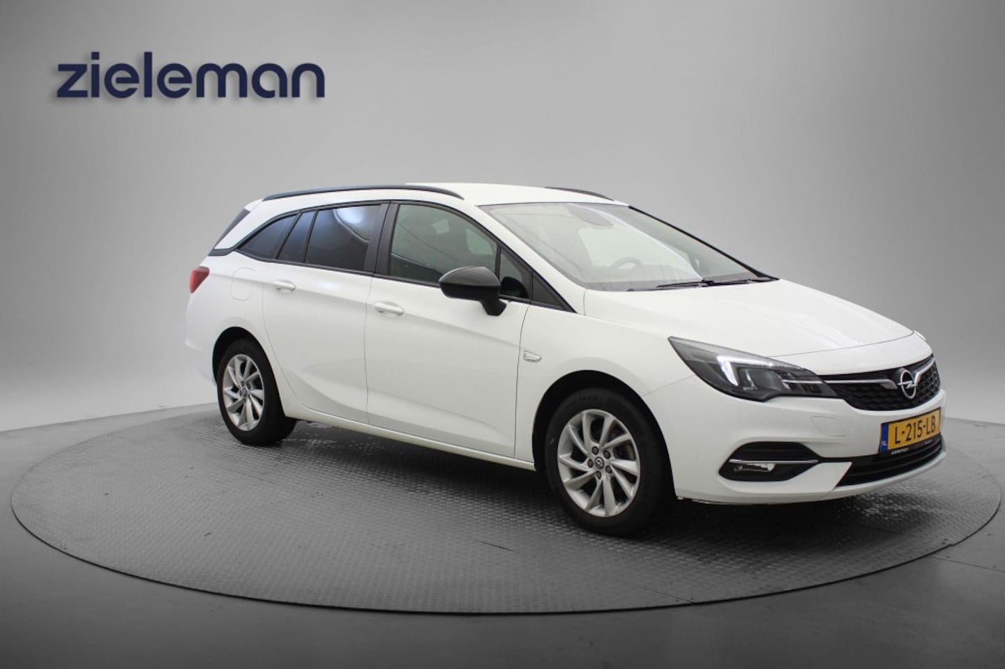 Opel Astra Sports Tourer - 1.2 Edition Sports Tourer  - Cruise, Navi, LM velgen - AutoWereld.nl