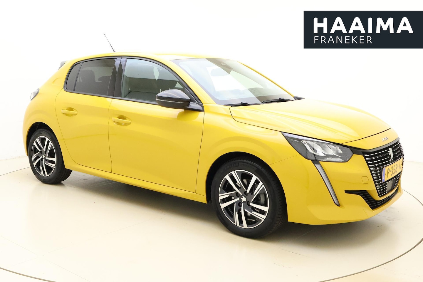 Peugeot 208 - 1.2 PureTech Allure Pack 100 PK | Handgeschakeld | Camera | Cruise Control | Climate Contr - AutoWereld.nl