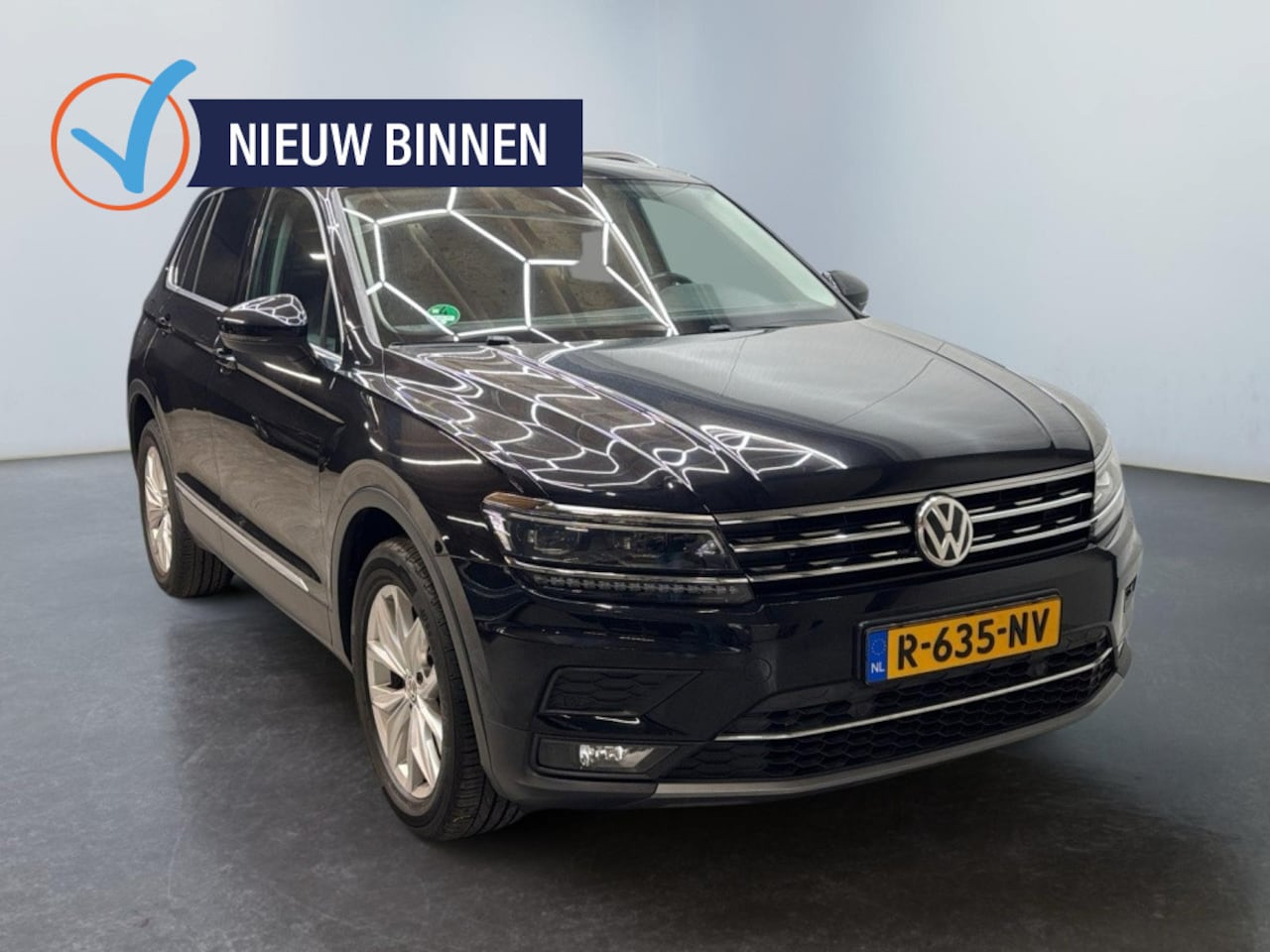 Volkswagen Tiguan - Volkswagen Tiguan 2.0 TDI 4Motion Highline - AutoWereld.nl