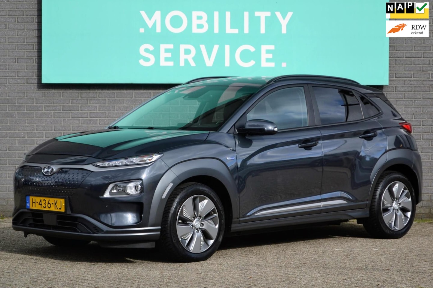 Hyundai Kona Electric - EV Premium 64 kWh SOH194% 3FASE Clima ACC CarPlay Leder LED Cam - AutoWereld.nl