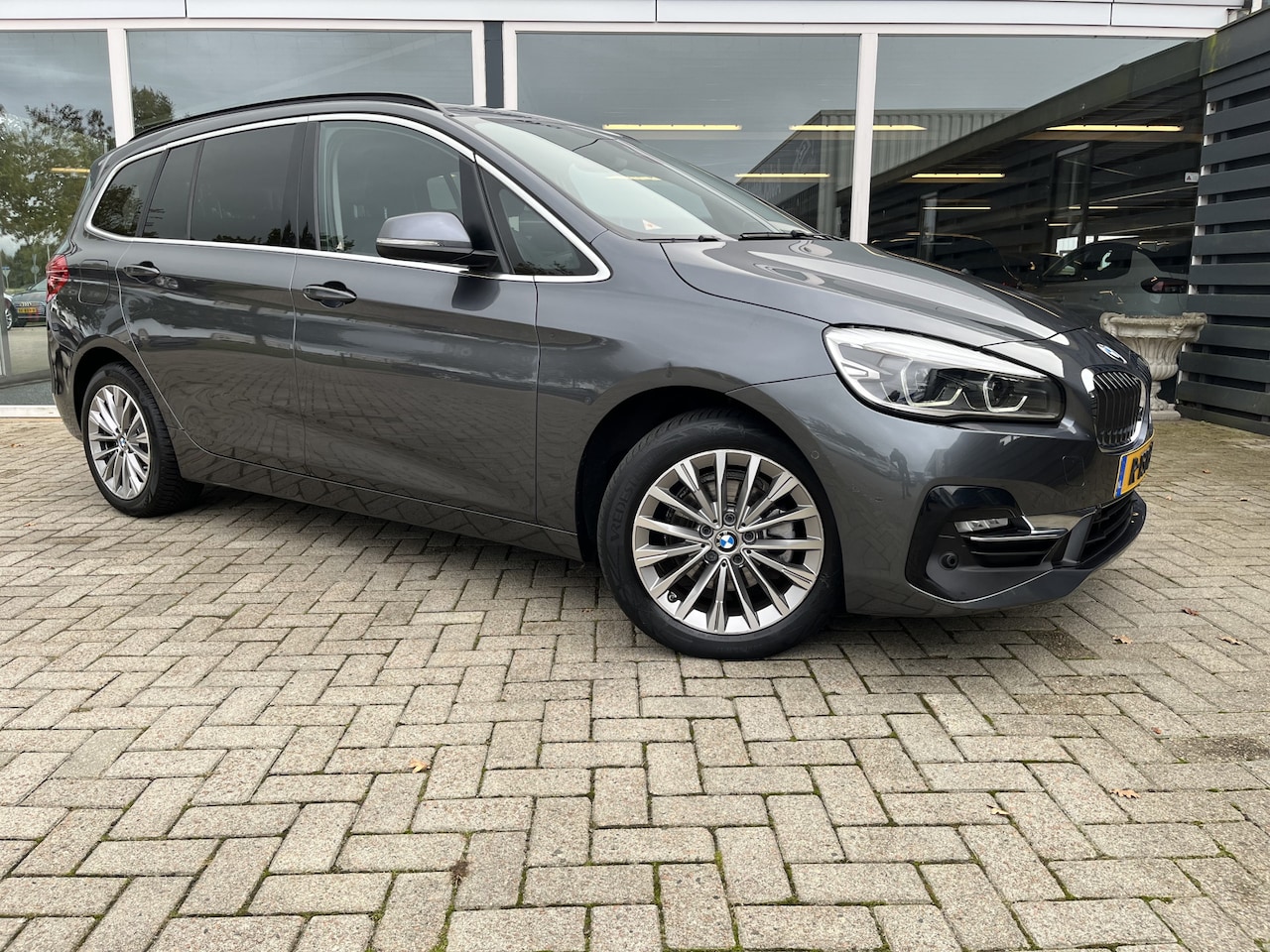 BMW 2-serie Gran Tourer - 216i Business Edition Plus 50% deal 9.975,- ACTIE 7 Persoons / Trekhaak / Leder / Camera / - AutoWereld.nl