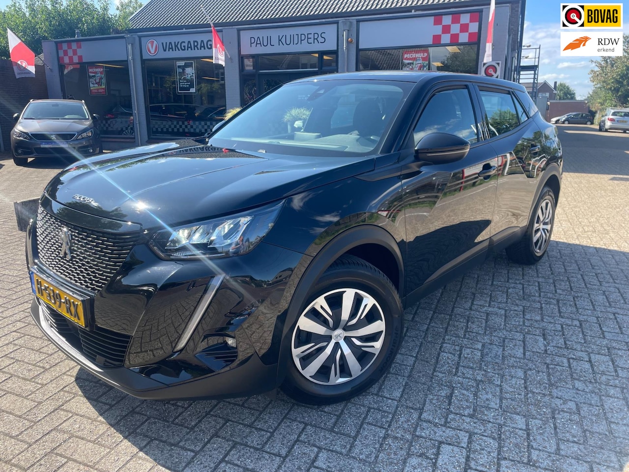 Peugeot 2008 - 1.2 PureTech 101PK BL Active *navi + pdc + 4-S banden + AppleCarPlay* - AutoWereld.nl