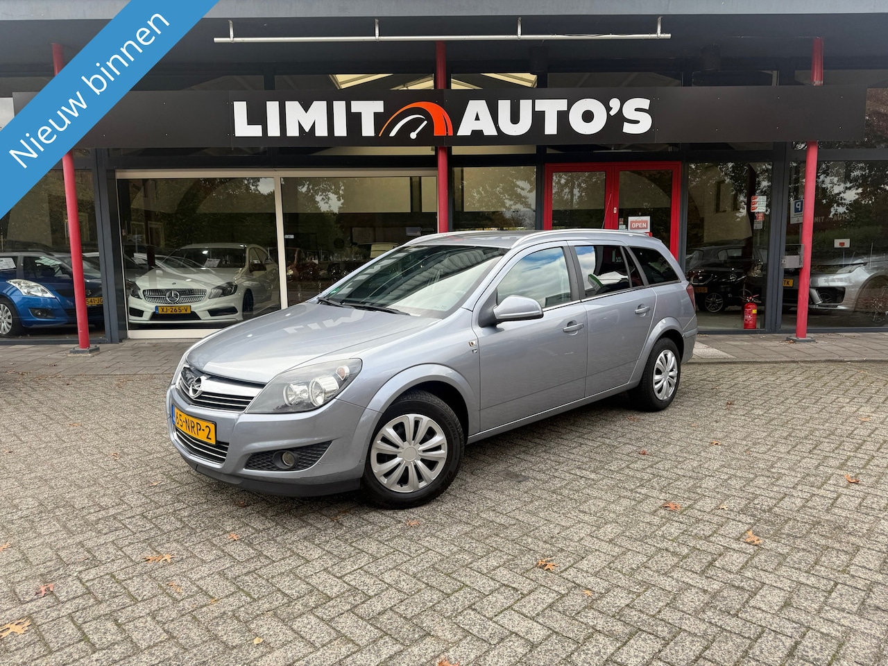 Opel Astra Wagon - 1.6 111 years Edition Airco/Cruise/Pdc/Navi/Trekhaak/El.ramen/Apk - AutoWereld.nl