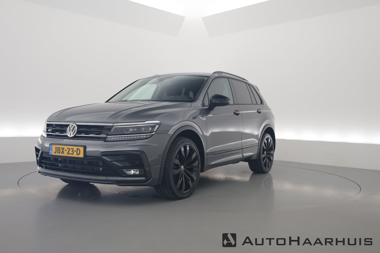 Volkswagen Tiguan - 2.0 TDI 4Motion R-Line DSG | Trekhaak | HUD |  Adapt. Cruise | CarPlay | Navi | Stoelverw. - AutoWereld.nl