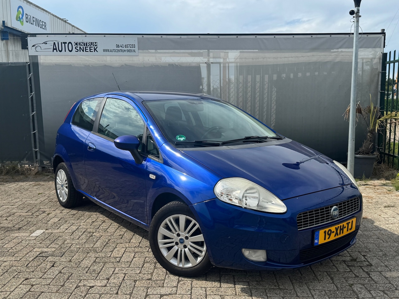 Fiat Grande Punto - 1.4 Dynamic - NWE APK - Airco - Cruise - AutoWereld.nl