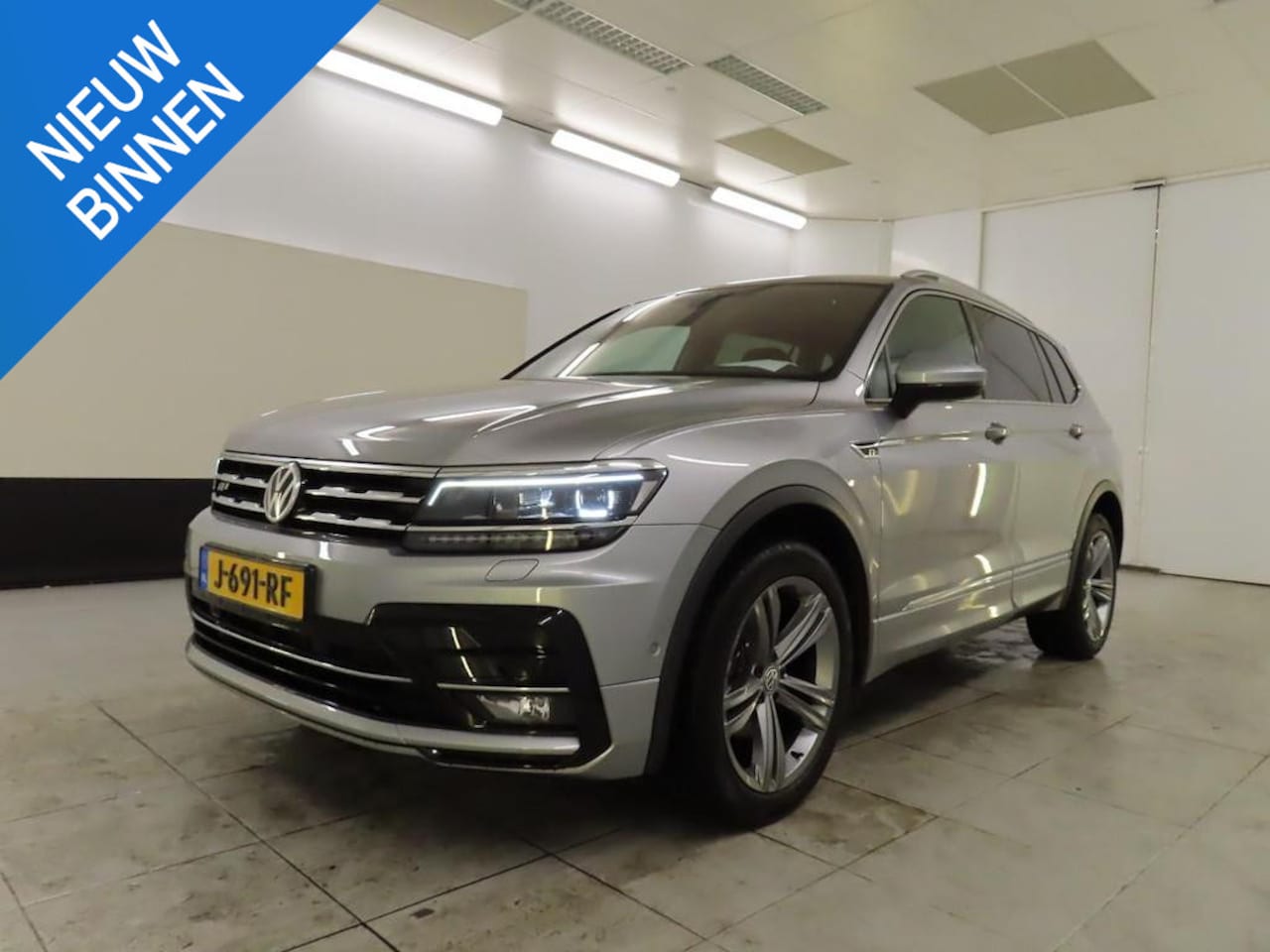 Volkswagen Tiguan Allspace - 1.5 TSI HIGHLINE BUSINESS R 7-PERS I LEDER PAKKET I TREKHAAK I SCHUIFDAK I AUTOMAAT I ADAP - AutoWereld.nl