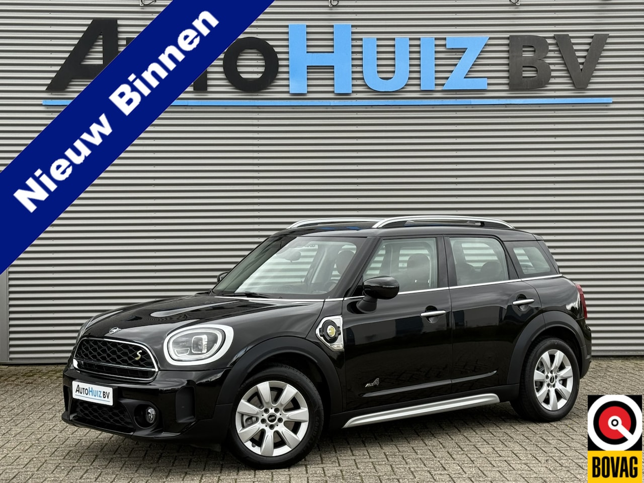 MINI Countryman - Mini 2.0 Cooper S E ALL4 Classic Leer Cruise Control Navigatie Carplay PDC Stoelverwarming - AutoWereld.nl