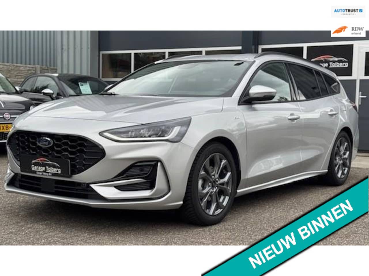 Ford Focus Wagon - 1.0 EcoBoost Hybrid ST Line in stijl volgrijs, nog geen 1100 km sportief design. rij als n - AutoWereld.nl