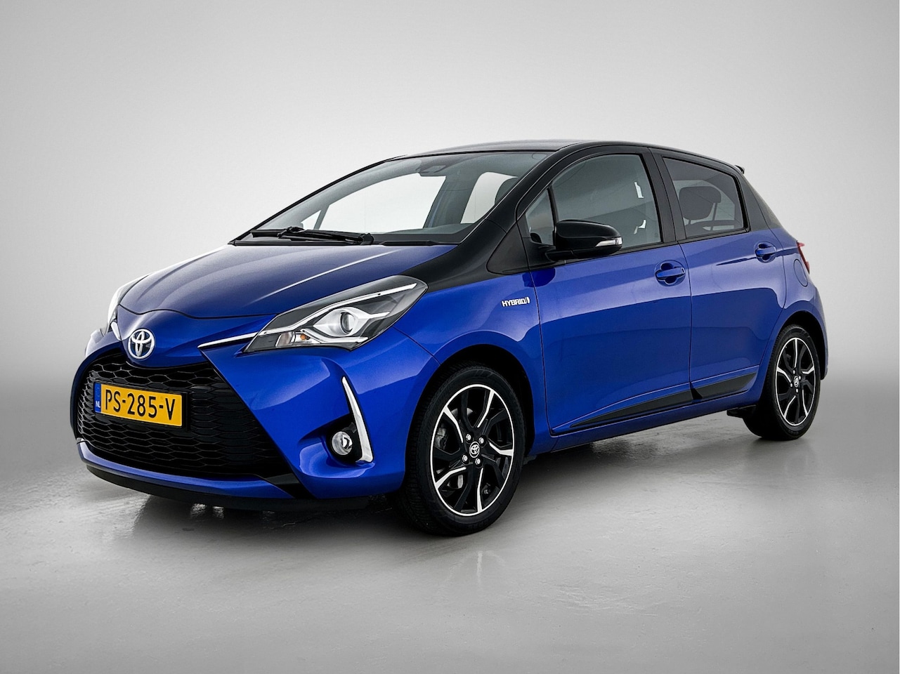 Toyota Yaris - 1.5 Hybrid Bi-Tone | Afneembare trekhaak | Navigatie | Cruise Control | - AutoWereld.nl