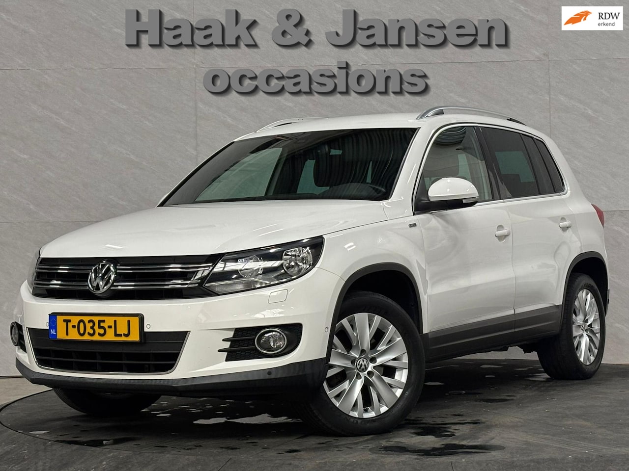 Volkswagen Tiguan - 2.0 TSI Sport&Style 4motion Automaat - AutoWereld.nl