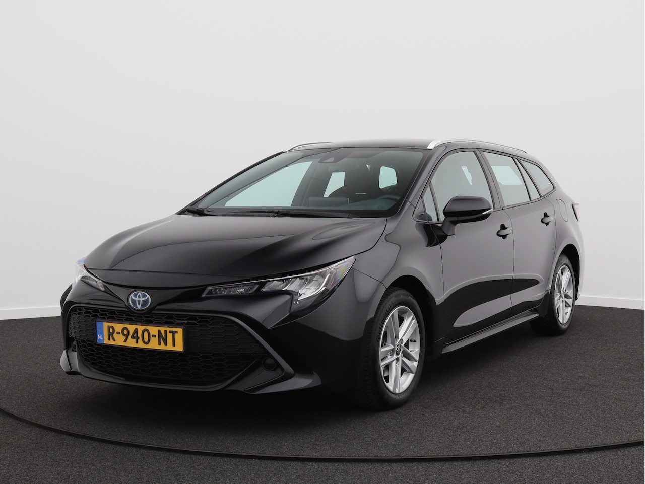 Toyota Corolla Touring Sports - 1.8 Hybrid Active/ lage km/ zeer mooi! - AutoWereld.nl