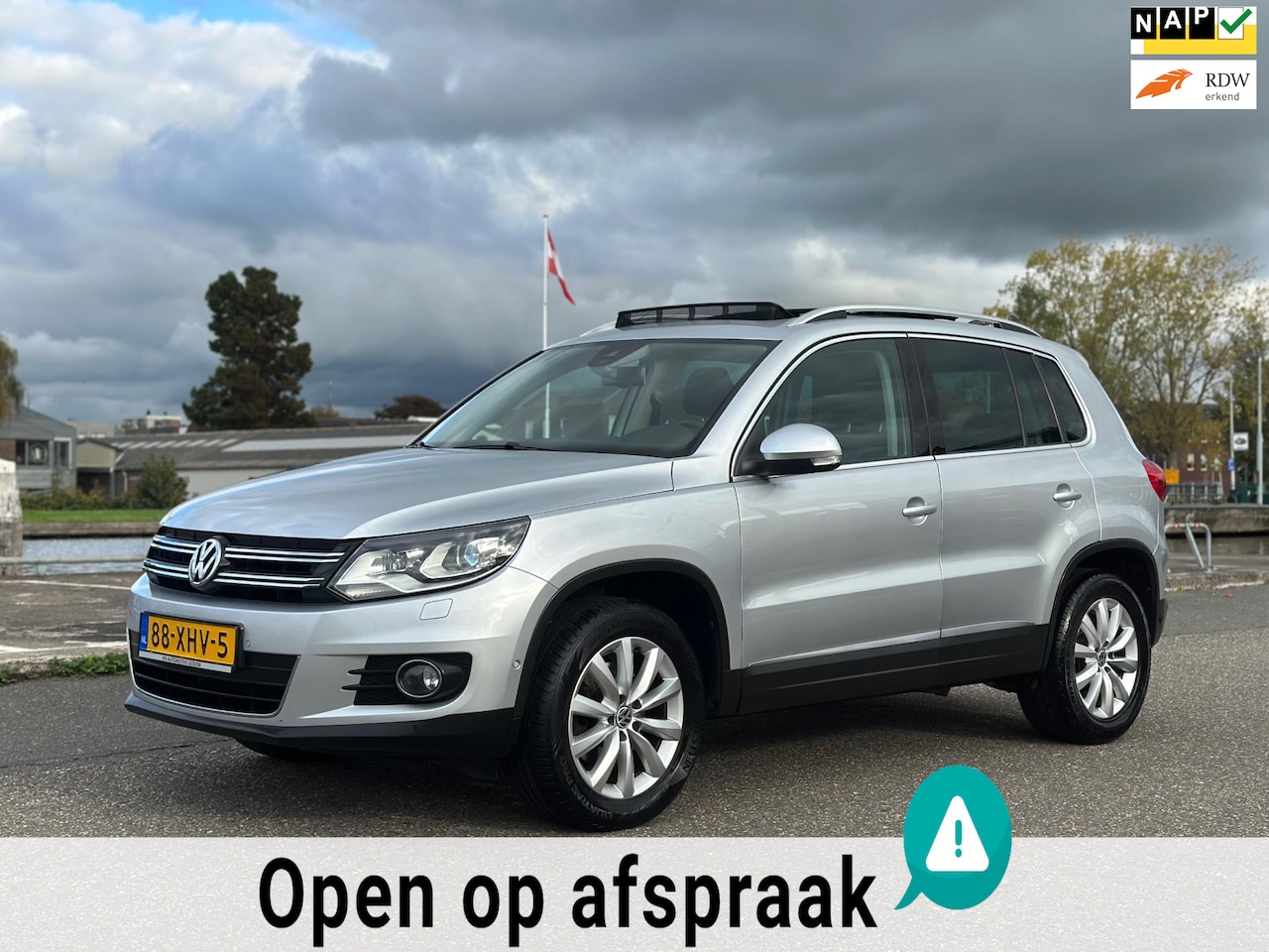 Volkswagen Tiguan - 1.4 TSI Sport&Style PANO DEALER ONDERHOUDEN 2EIG - AutoWereld.nl
