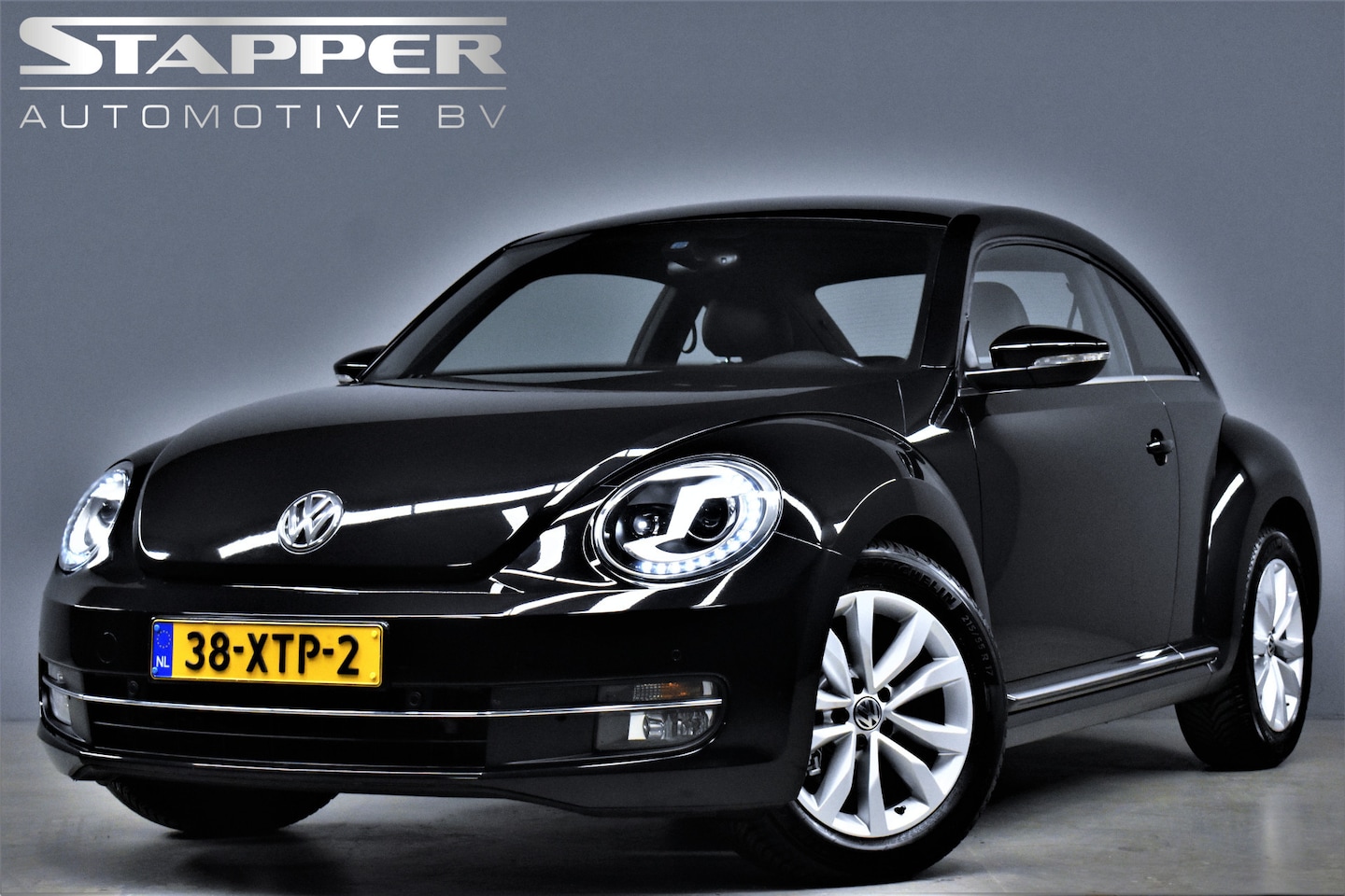 Volkswagen Beetle - 1.4 TSI 160pk Design Org.NL Fender/Leer/Navi/Xenon/Led/Keyless/Bluetooth/Pdc/Lmv - AutoWereld.nl