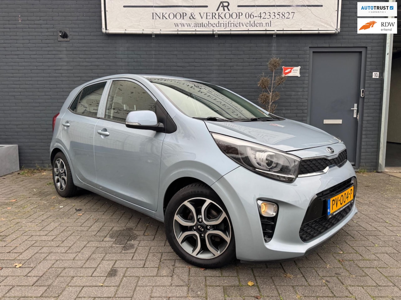 Kia Picanto - 1.0 CVVT First Edition Navi Camera CarPlay! Inruil mogelijk! - AutoWereld.nl