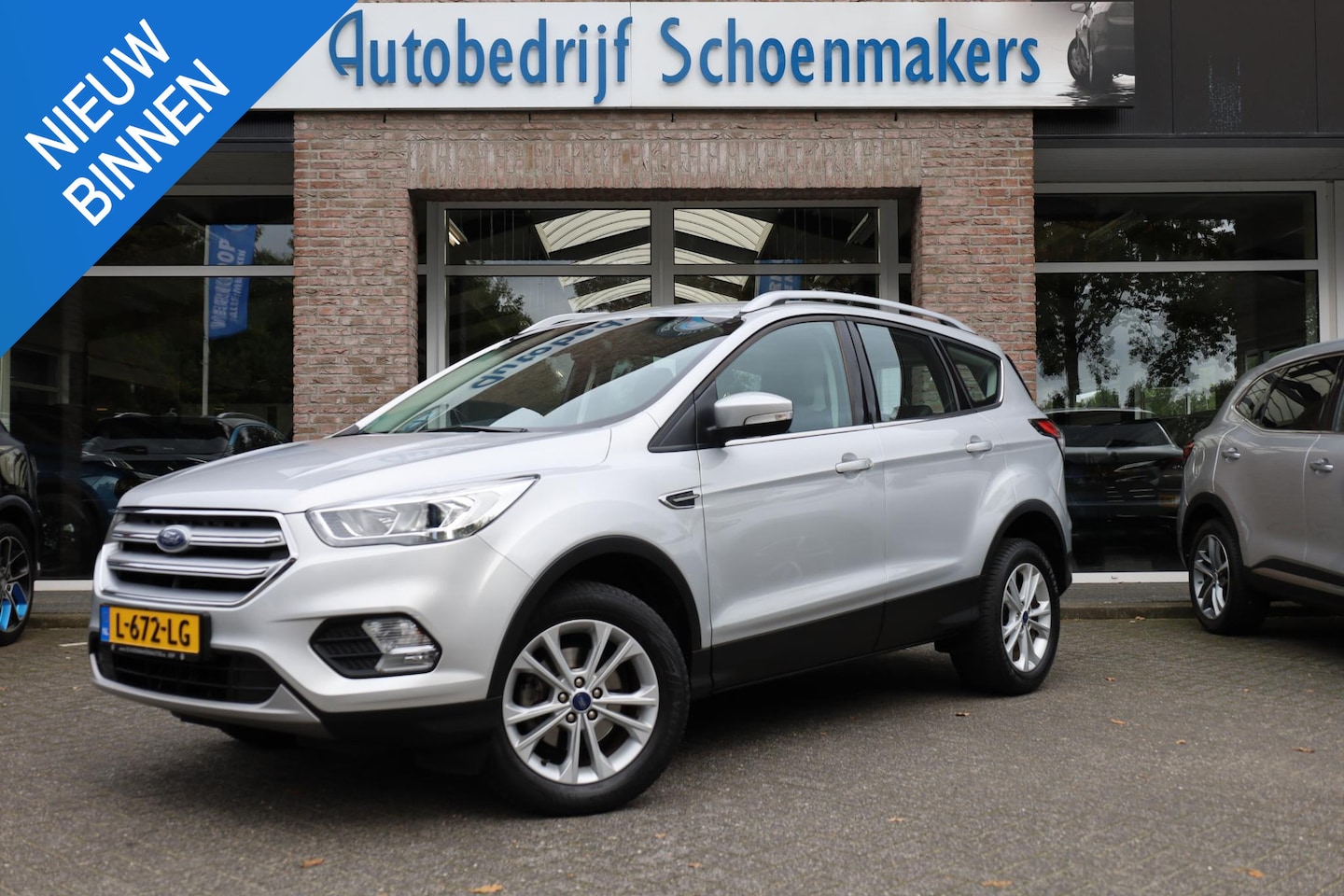 Ford Kuga - 1.5 EcoBoost Titanium HALF-LEER TREKHAAK KEYLESS-START CLIMA CRUISE NAVI BT-TELEFOONVERB. - AutoWereld.nl