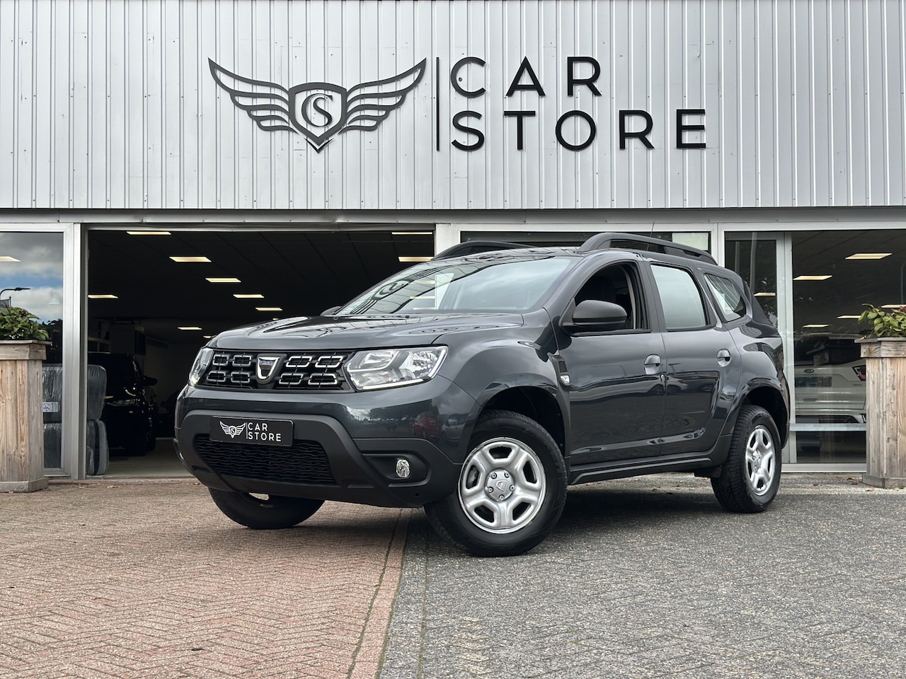 Dacia Duster - 1.0 TCe Essential |AIRCO|CAMERA|PDC|CRUISE|TREKHAAK - AutoWereld.nl