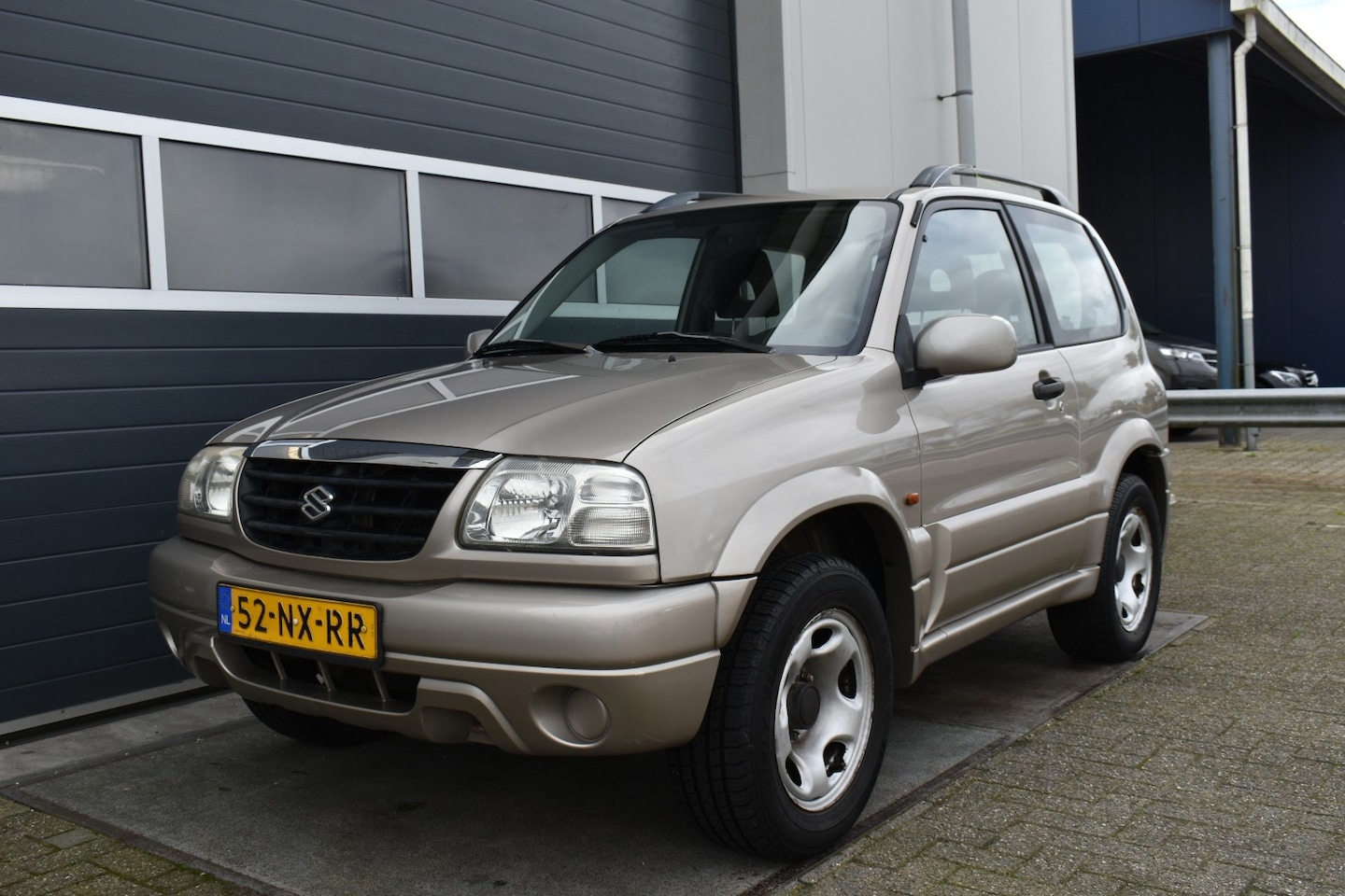 Suzuki Grand Vitara - 2.0 Metal Top 4X4 - AutoWereld.nl