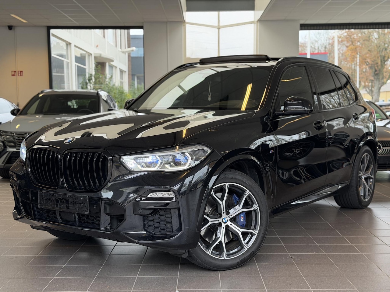 BMW X5 - xDrive45e Executive PANO / NAVI / 360 / LASER BTW - AutoWereld.nl