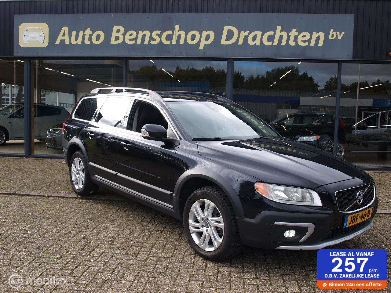 Volvo XC70 - AWD 2.4 5CYL Aut6 Leer Pdc Clima Cruise Beurt uitgevoerd - AutoWereld.nl