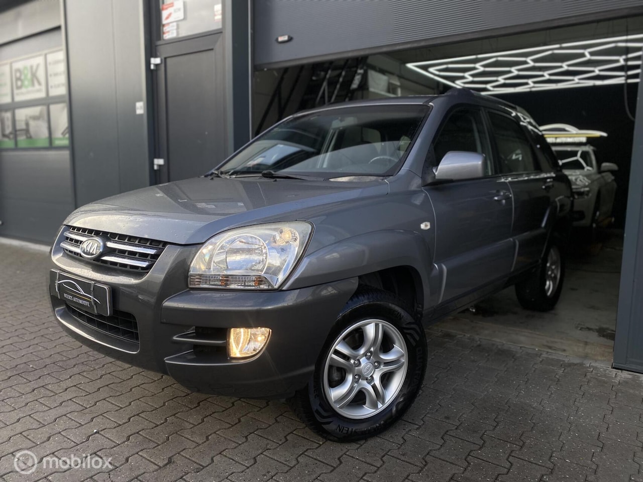 Kia Sportage - 2.0 CVVT Comfort |AIRCO|CRUISE|TREKHAAK|NAP! - AutoWereld.nl