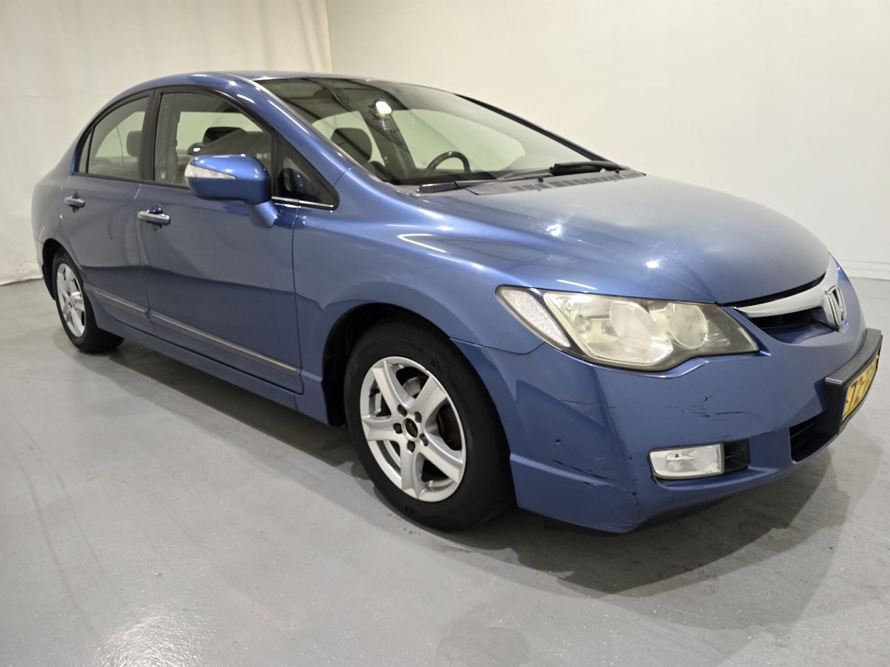 Honda Civic - 1.3 i-DSI i-VTEC MHEV 85Kw LM Bjr,2006 - AutoWereld.nl