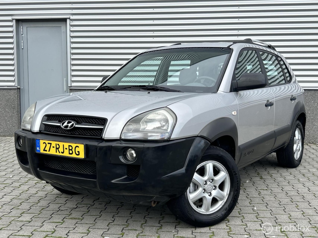 Hyundai Tucson - 2.0i Active 2.0i Active - AutoWereld.nl