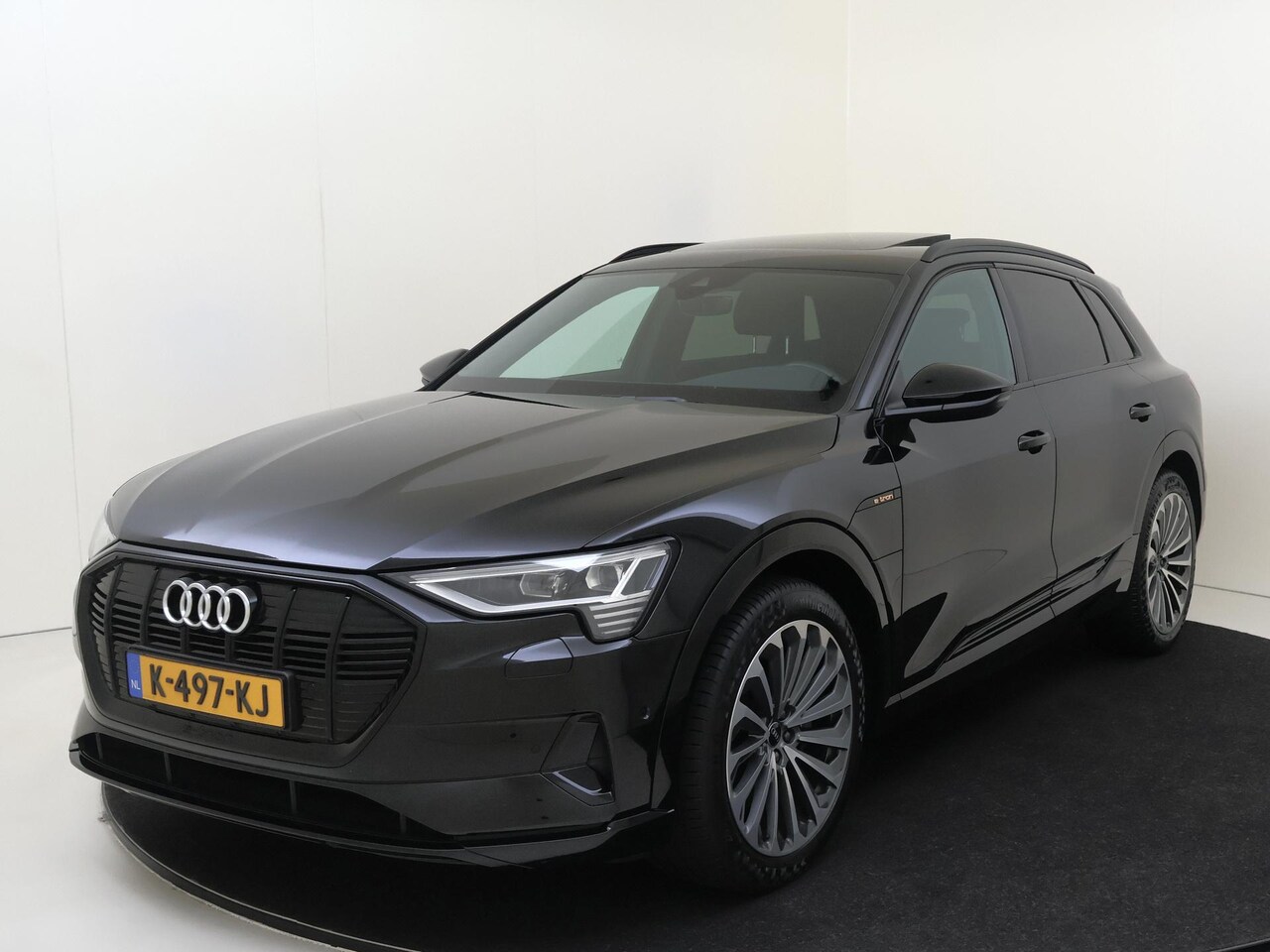 Audi e-tron - 50 quattro Business edition Plus 71 kWh | Panoramadak | Luchtvering | Lederen bekleding | - AutoWereld.nl