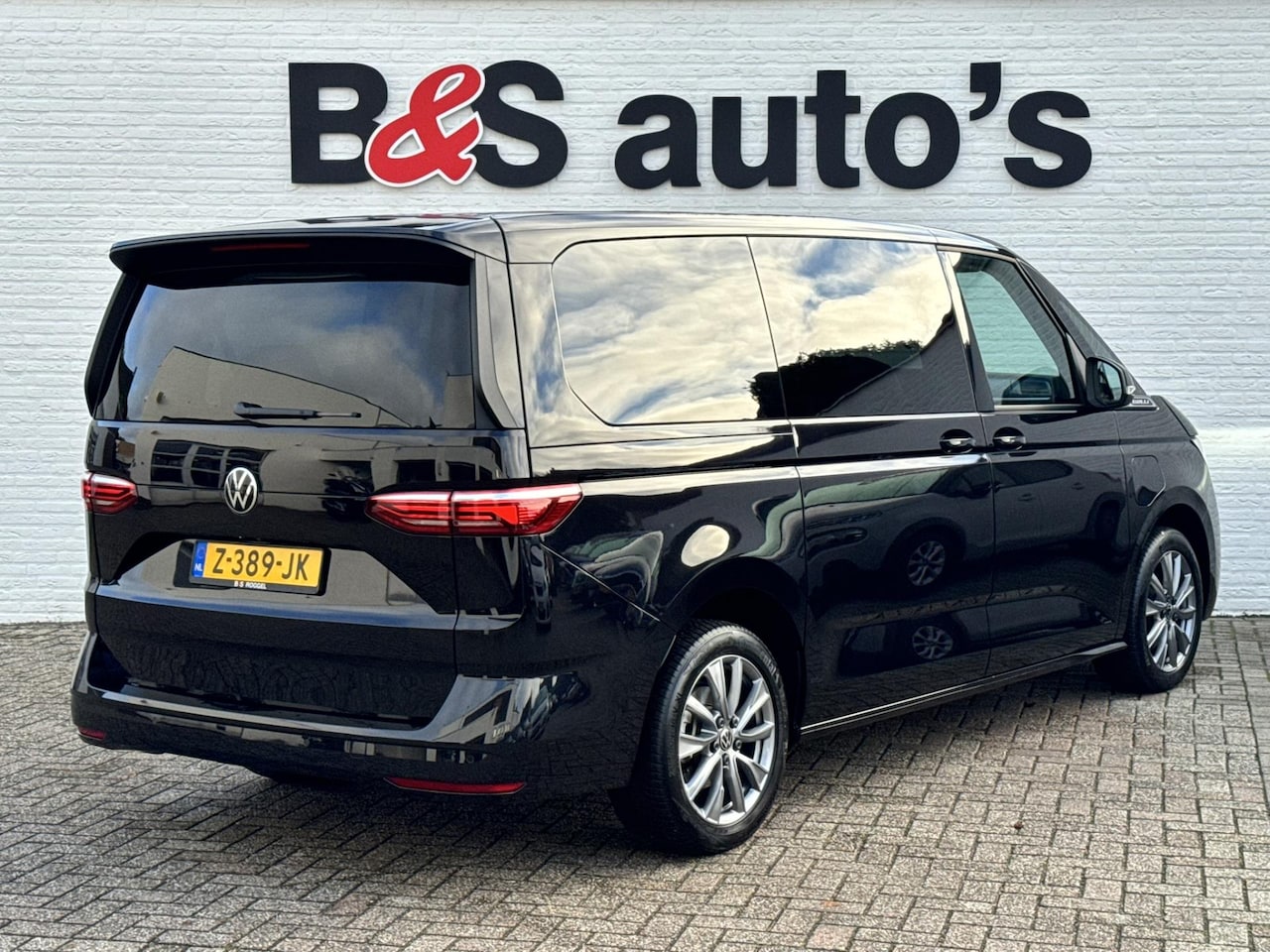 Volkswagen Multivan - 1.4 eHybrid L1 Bulli Edition Climate control v/a Cruise control Full LED Matrix Pano Navig - AutoWereld.nl