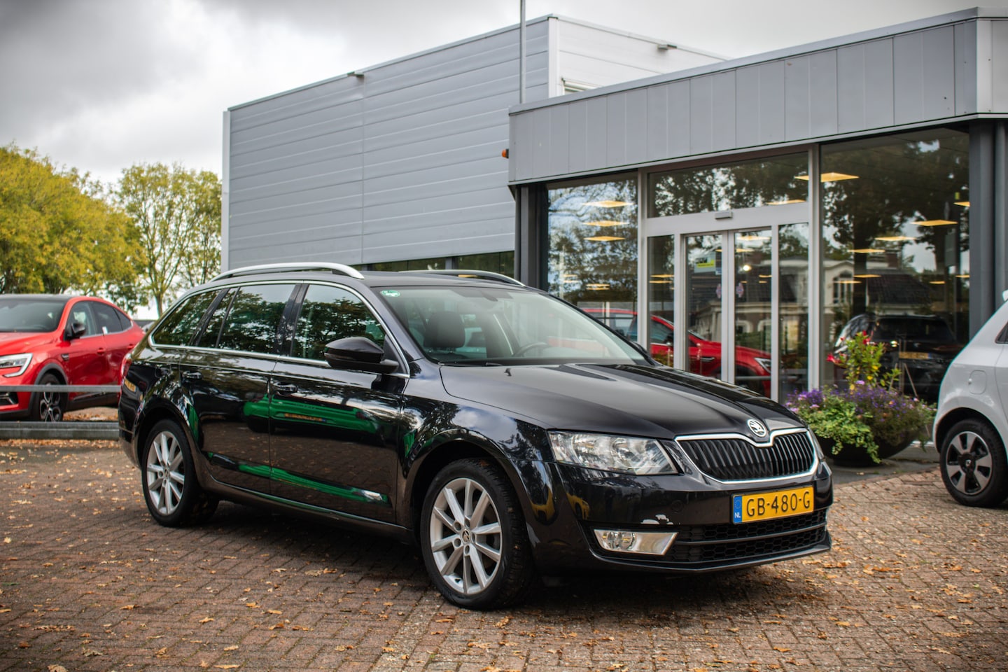 Skoda Octavia Combi - 1.6 TDI Greentech Ambition Businessline | Trekhaak | Panorama dak - AutoWereld.nl