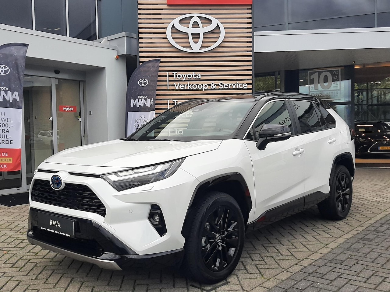 Toyota RAV4 - 2.5 Hybrid Bi-Tone ALL-SEASON 360° CAMERA LEDER BLIND-SPOT NAVI STOEL/STUURVERW ELEK-ACHTE - AutoWereld.nl