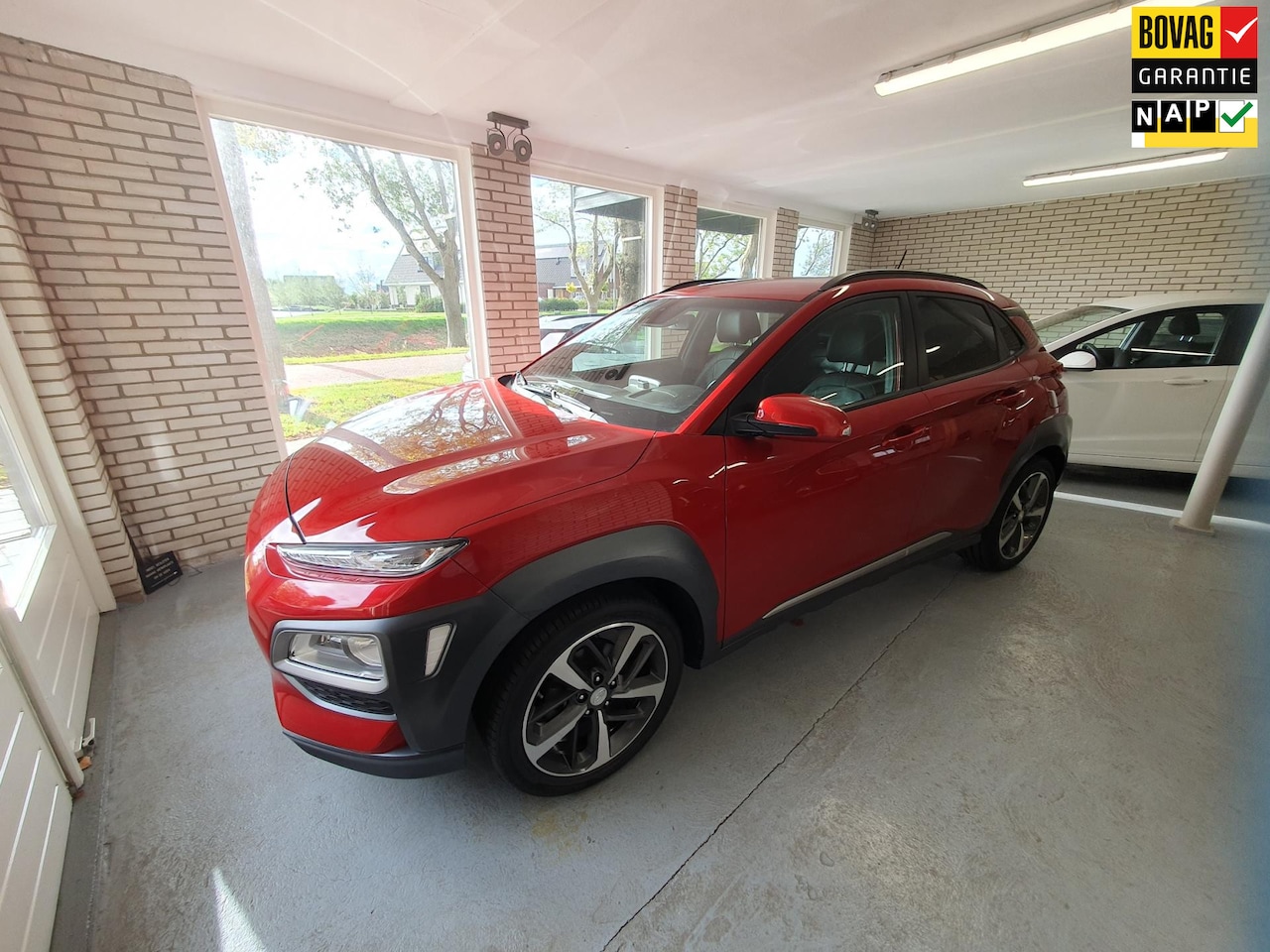 Hyundai Kona - 1.0T Premium |Camera|Trekhaak|Navigatie|Cruise control - AutoWereld.nl
