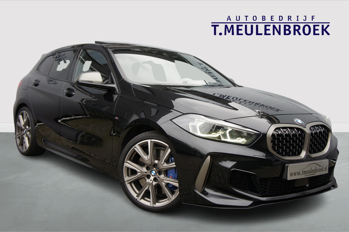 BMW 1-serie - M135i xDrive High Executive Panoramadak, Head up - AutoWereld.nl