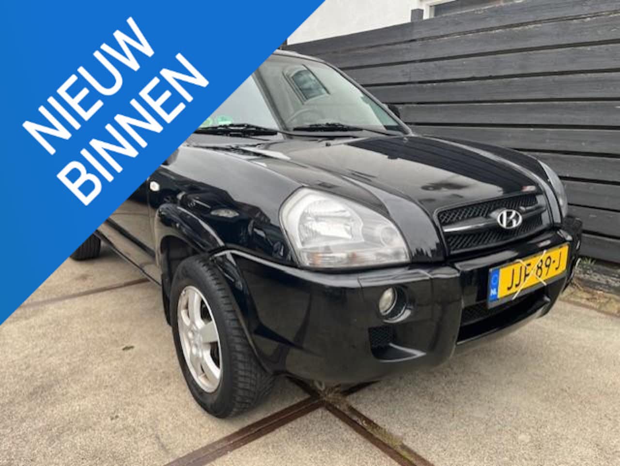 Hyundai Tucson - 2.0i Active 2 JAAR APK!/AIRCO/LEER/TREKHAAK/NETTE AUTO! - AutoWereld.nl
