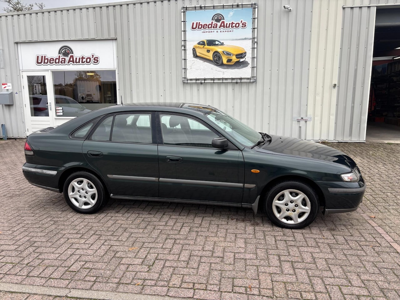Mazda 626 - 1.8i LX 5 DEURS AIRCO NL AUTO 1500E APK 8,2026 - AutoWereld.nl